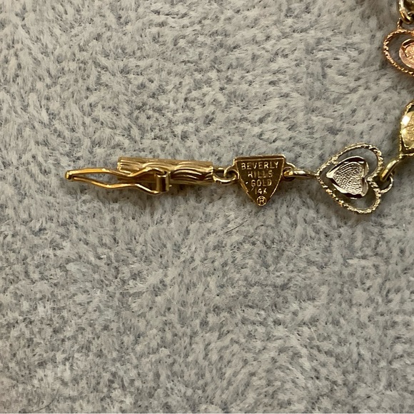 Beverly Hills Gold: 14k.tri colored gold heart shaped tennis 7” inch bracelet. - Picture 6 of 8